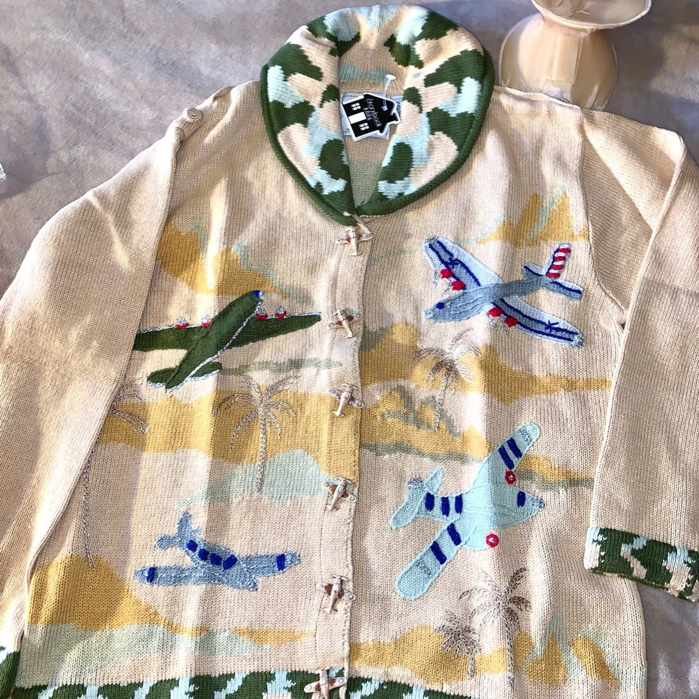 Vintage cardigan  by  Storybook Knits and features a whimsical airplane NEW